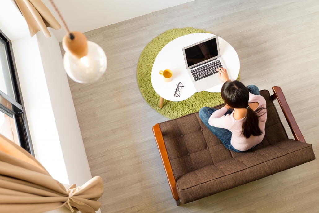 Top view of woman using computer for working at home Flexible worker, working from home