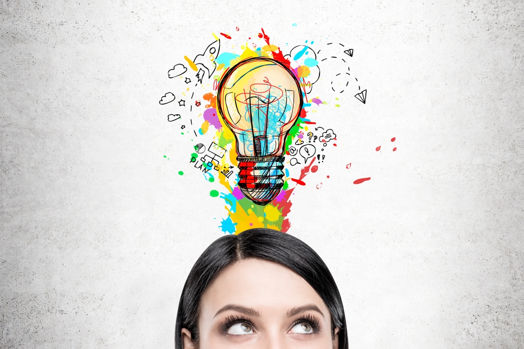 Woman with black hair and colorful light bulb