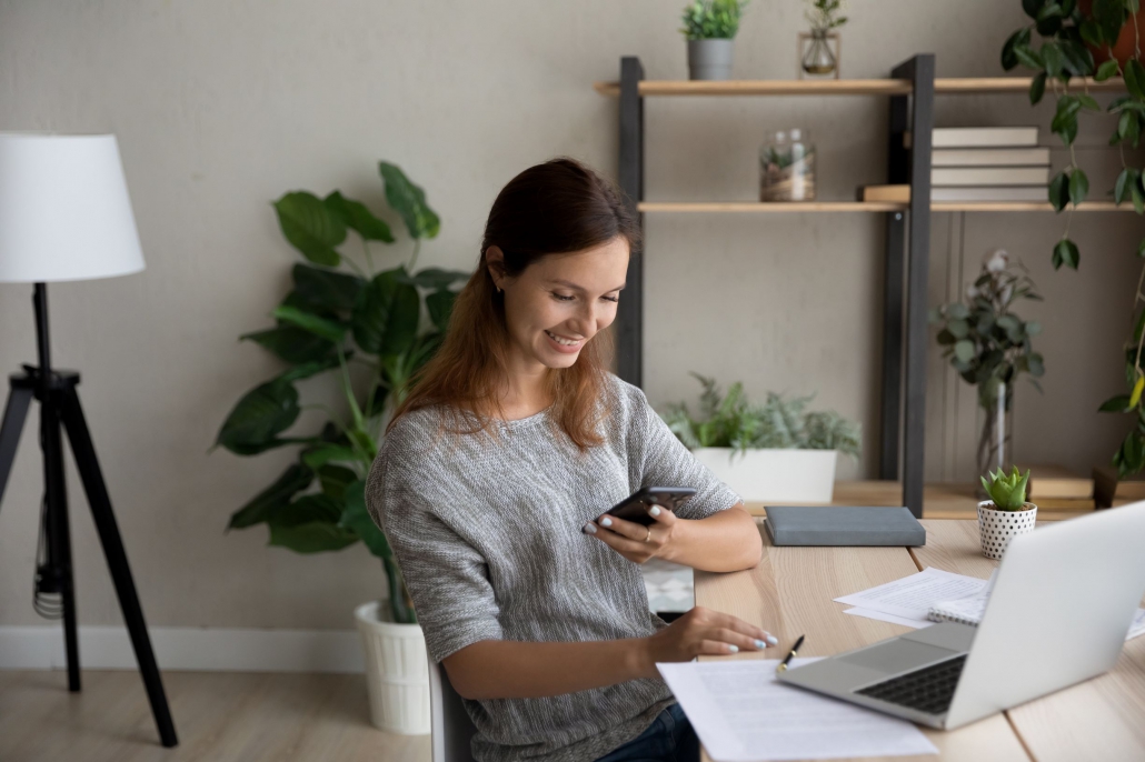Happy working from home again small# Happy homeworker reading employee engagement text