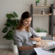 Happy homeworker reading employee engagement text